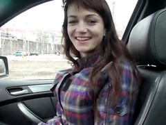 Brunette amateur cutie sucking a mean pecker in the car