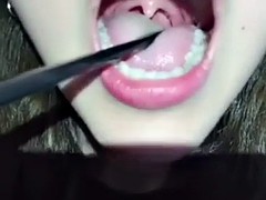 chinese girl uvula (was she swallowing with her open mouth at 0:56?)