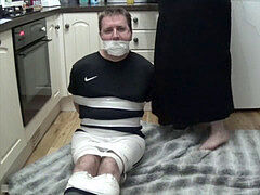Footballer bound and ball-gagged cock-squeezing in duct tape two