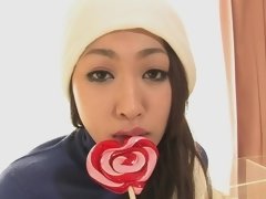 Pretty Asian babe serves the hard dicks at the same time