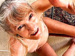 Cute-looking mature angel Lisa Cognee opens her shaved pussy
