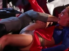 Supergirl gets nailed on table by hung Batman