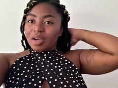 Busty African girl gets her nipples pierced