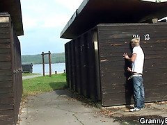 Old blonde granny rides cock on public