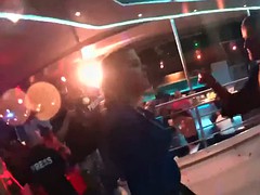 Slutty girls dancing erotically in a club