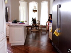 Pair of sexy lesbians licking and playing with vibrator on the couch