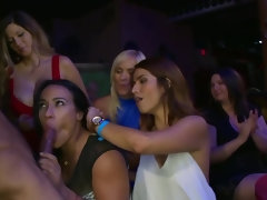 Black stripper entertains excited chicks with his massive boner