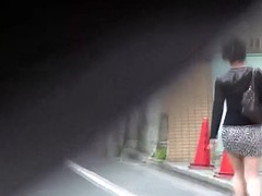 Nasty japanese babe caught while taking a pee in public