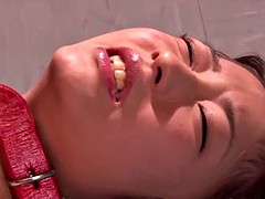 Leashed asian teen stuffed with buttplug