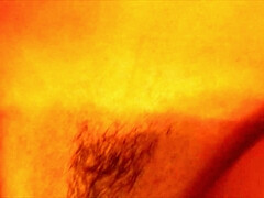 Blonde vixen captivates with sultry allure in a daring lingerie solo tease