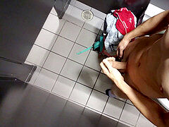 Exhibitionist wanks Off at engaged Airport bathroom with Door Open and Cums