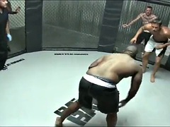Stacy Adams jumps on the winners cock in the MMA cage and swallows his cum