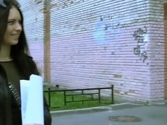 A hot girl is dancing around a pole and also around a cock