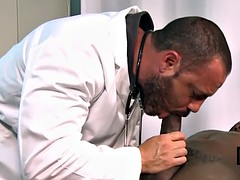 gay doctor checking penis firmness with mouth