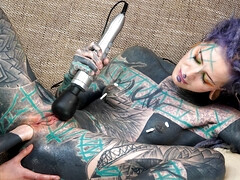 Inked lesbians try fist fucking in a generous duo