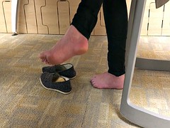 Candid student college feet in library