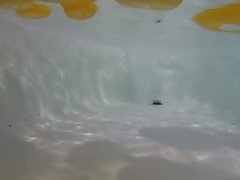 Nadia takes a bath with some rubber duckies