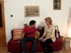 Mature gets drilled by younger guy on the couch
