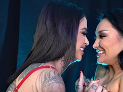 Busty tattooed babe licks her girlfriends pussy after casting