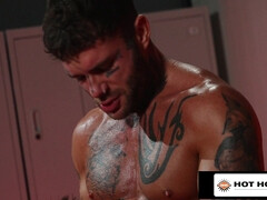 Red Arousing Tattooed Hunk Shoves His Massive Knob Into Jock