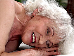 Young blonde granny pounded hard by masseur during massage in doggystyle