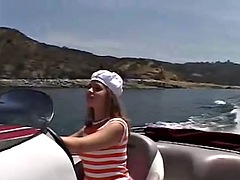 Sexy teen April plays with her pussy outdoors in a rubber boat