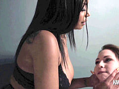 Havana Ginger pokes Angel Smalls with a strap fuck stick dildo