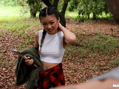 Exotic bimbo Lulu Chu pleasures muscled dude in the woods