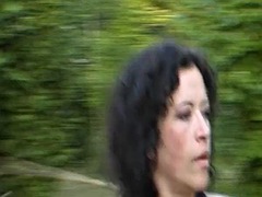 A dark haired lady from Germany making a dude worship her