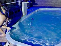 Caught in the act! Two brunettes get caught masturbating in the condo pool