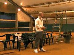 Two sexy busty female players and their coach in the locker room