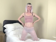 Esme masturbates in bed all dressed in pink