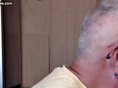 Gay Daddy adores sucking gloryhole penis at his home