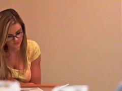 Busty blonde is placing her mouth on a hard cock