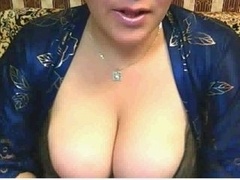 Russian plump broad shows big tits and plus plays with them