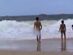 Public beach sex of a voyeur horny couple